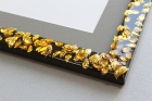 Gold leaves, black frame resin detail